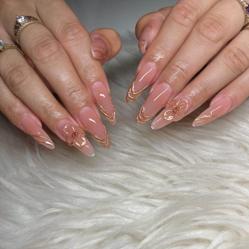 Chic almond nails with a subtle ombre design, combining pastel tones for a classic and modern look