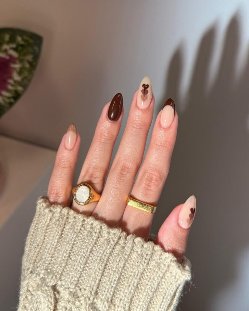 Chic almond nails with a subtle ombre design, combining pastel tones for a classic and modern look