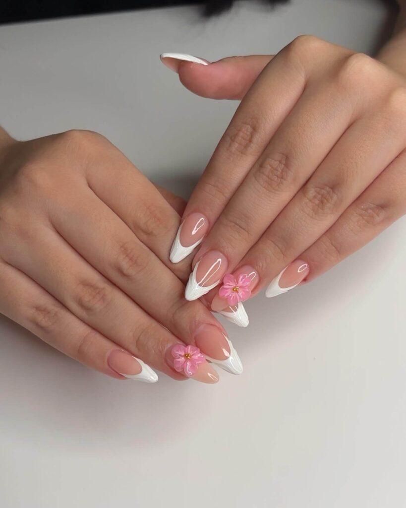 Chic almond nails with a subtle ombre design, combining pastel tones for a classic and modern look