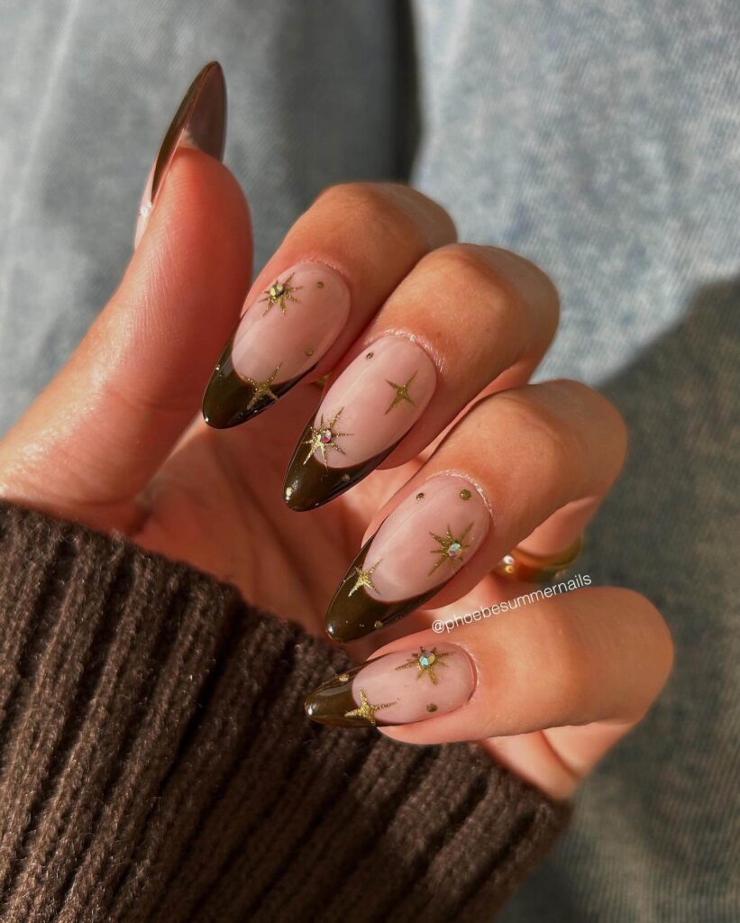 Chic almond nails with a subtle ombre design, combining pastel tones for a classic and modern look