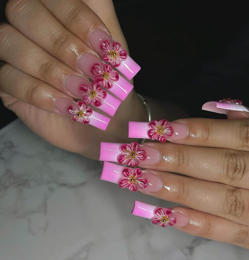 Flower nails with delicate daisy designs, perfect for a fresh spring manicure