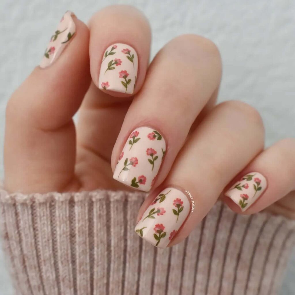 Flower nails with delicate daisy designs, perfect for a fresh spring manicure