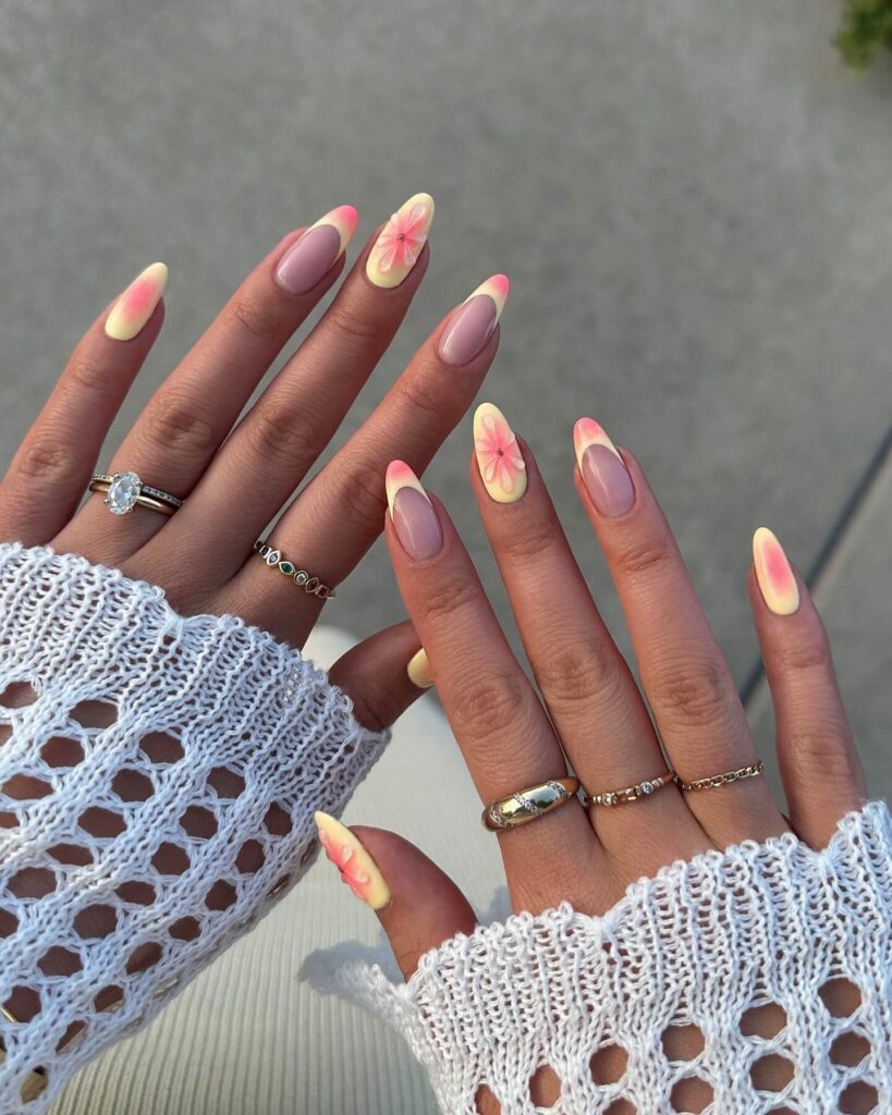 Flower nails with delicate daisy designs, perfect for a fresh spring manicure