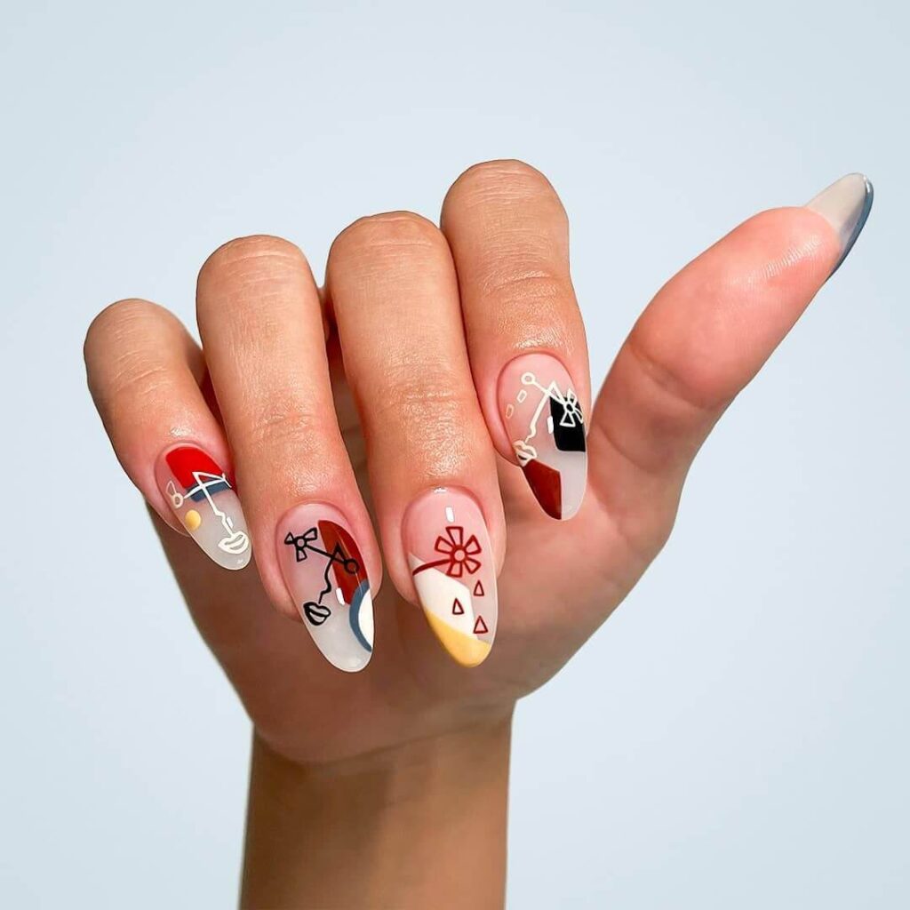 Abstract nail art with vibrant geometric designs and bold color patterns, perfect for creative manicures