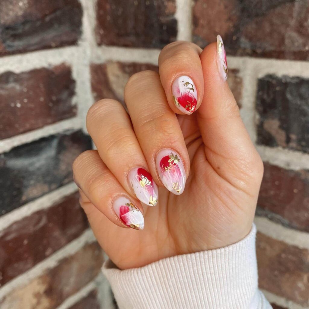 Abstract nail art with vibrant geometric designs and bold color patterns, perfect for creative manicures