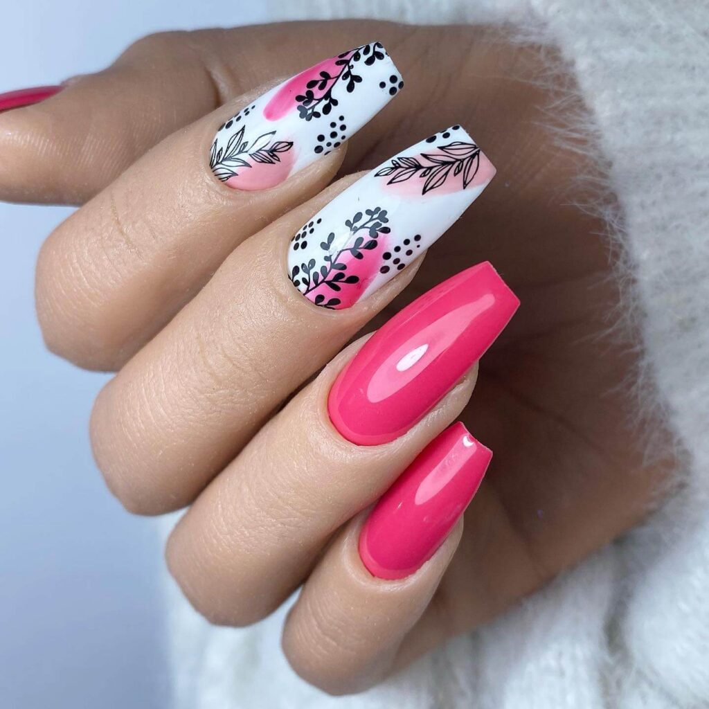 Abstract nail art with vibrant geometric designs and bold color patterns, perfect for creative manicures