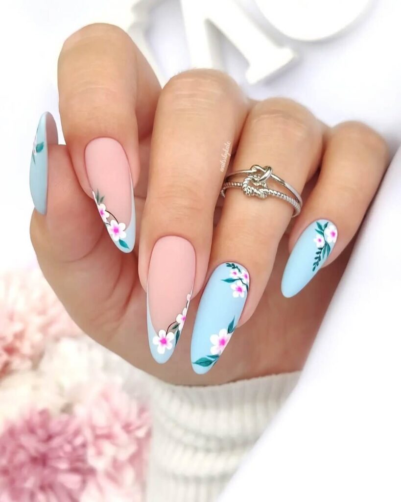 Stylish sky blue nails with a glossy finish, perfect for fresh and modern spring or holiday nail designs