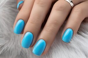 Stylish sky blue nails with a glossy finish, perfect for fresh and modern spring or holiday nail designs