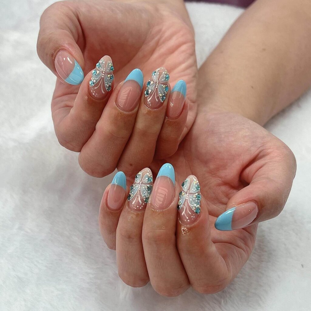 Stylish sky blue nails with a glossy finish, perfect for fresh and modern spring or holiday nail designs